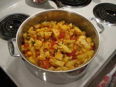 Add Cauliflower & Potatoes. Cover & Cook 