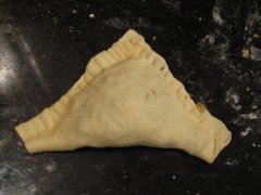 Dampen the Edges, Fold Over, and Seal With Fork